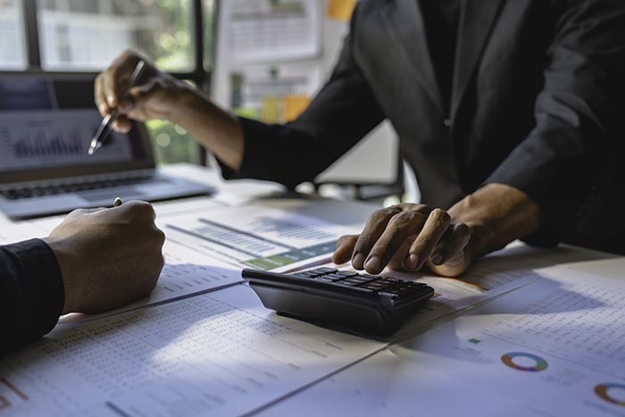 Financial Analyst Working on Reporting