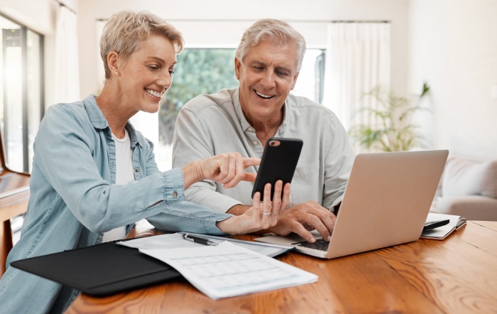A couple reviews their investment options.